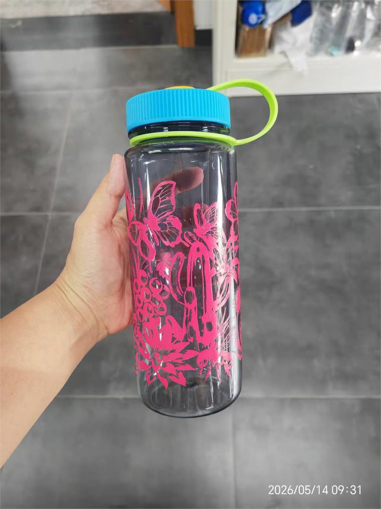 Custom printed clear Tritan style water bottle with colored lid